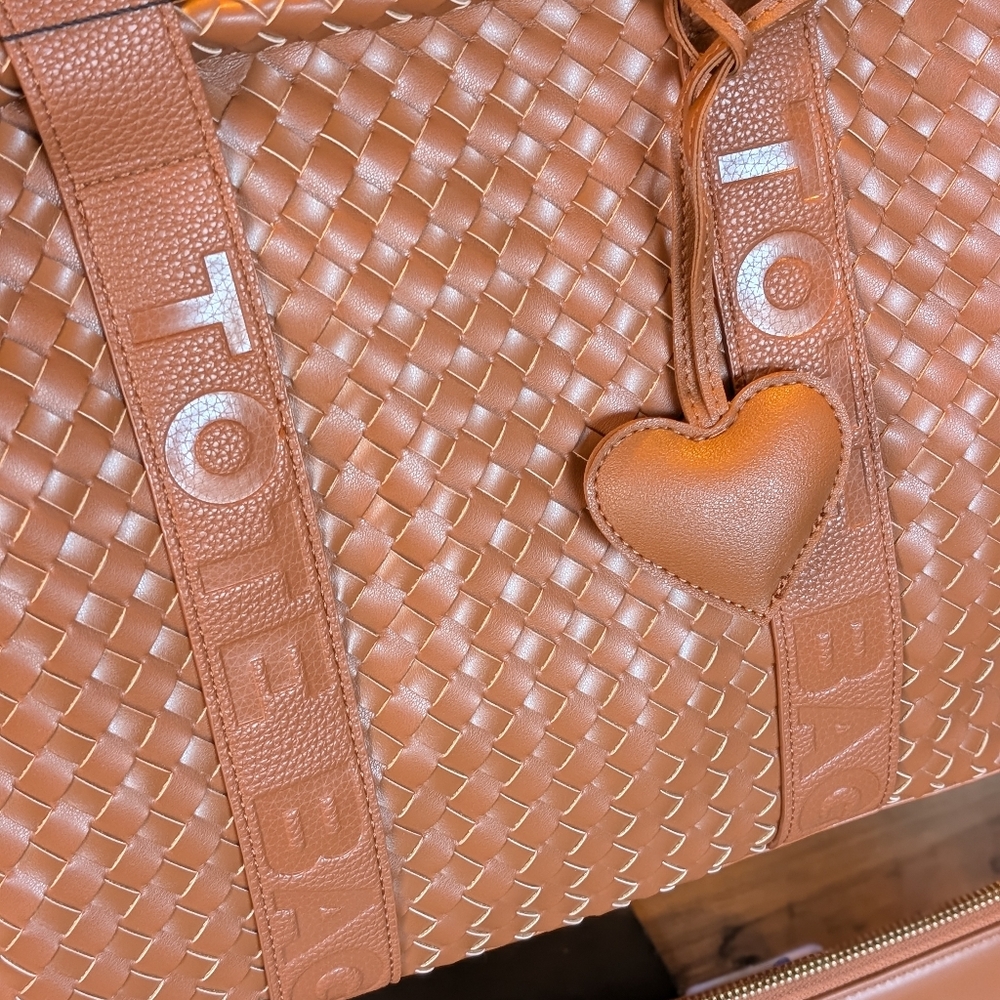 Brown Woven Tote Bag With Wallet And Heart Charm And Crossbody Strap.